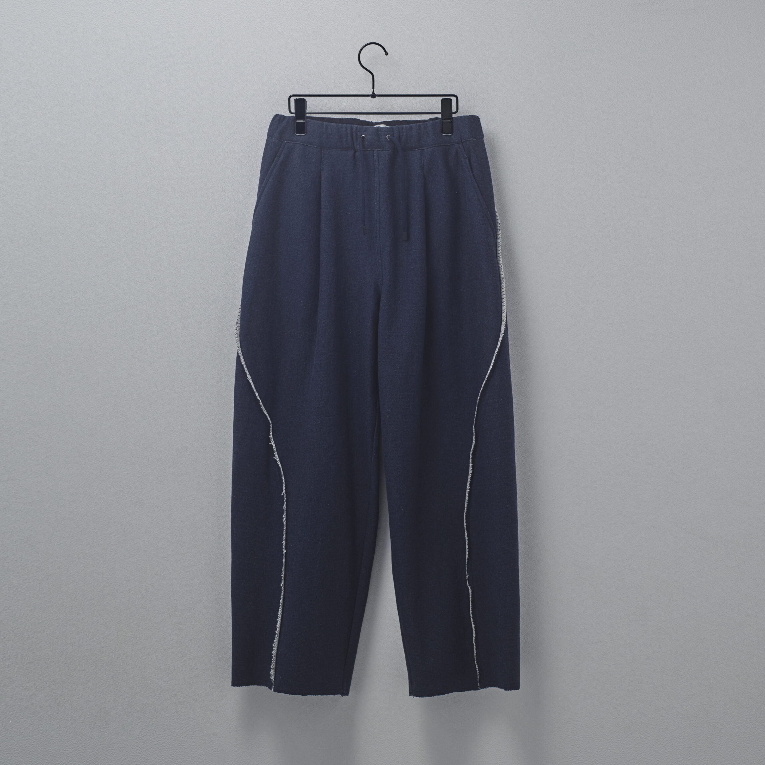 HAKEEM TWIST TROUSERS “top navy”