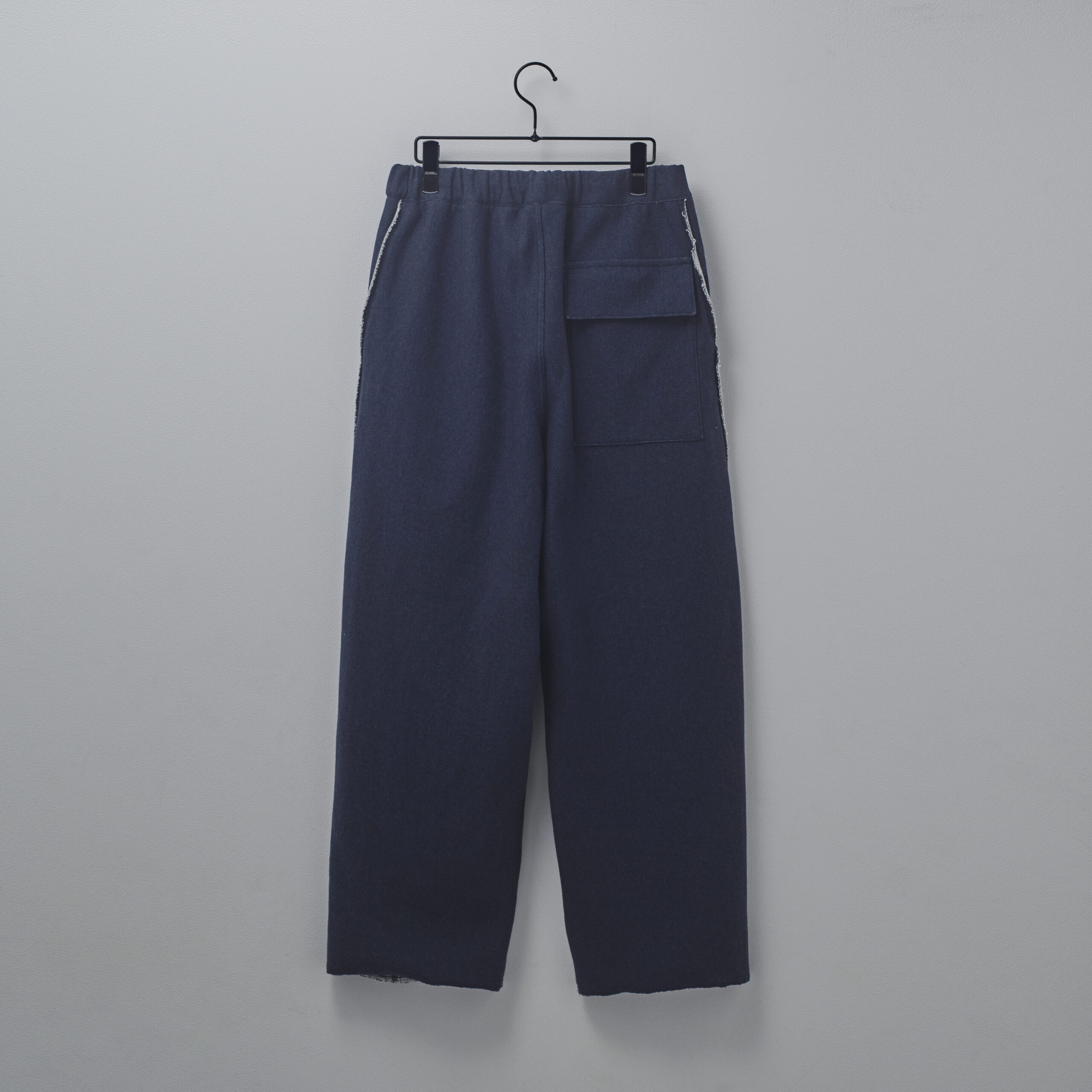 HAKEEM TWIST TROUSERS “top navy”