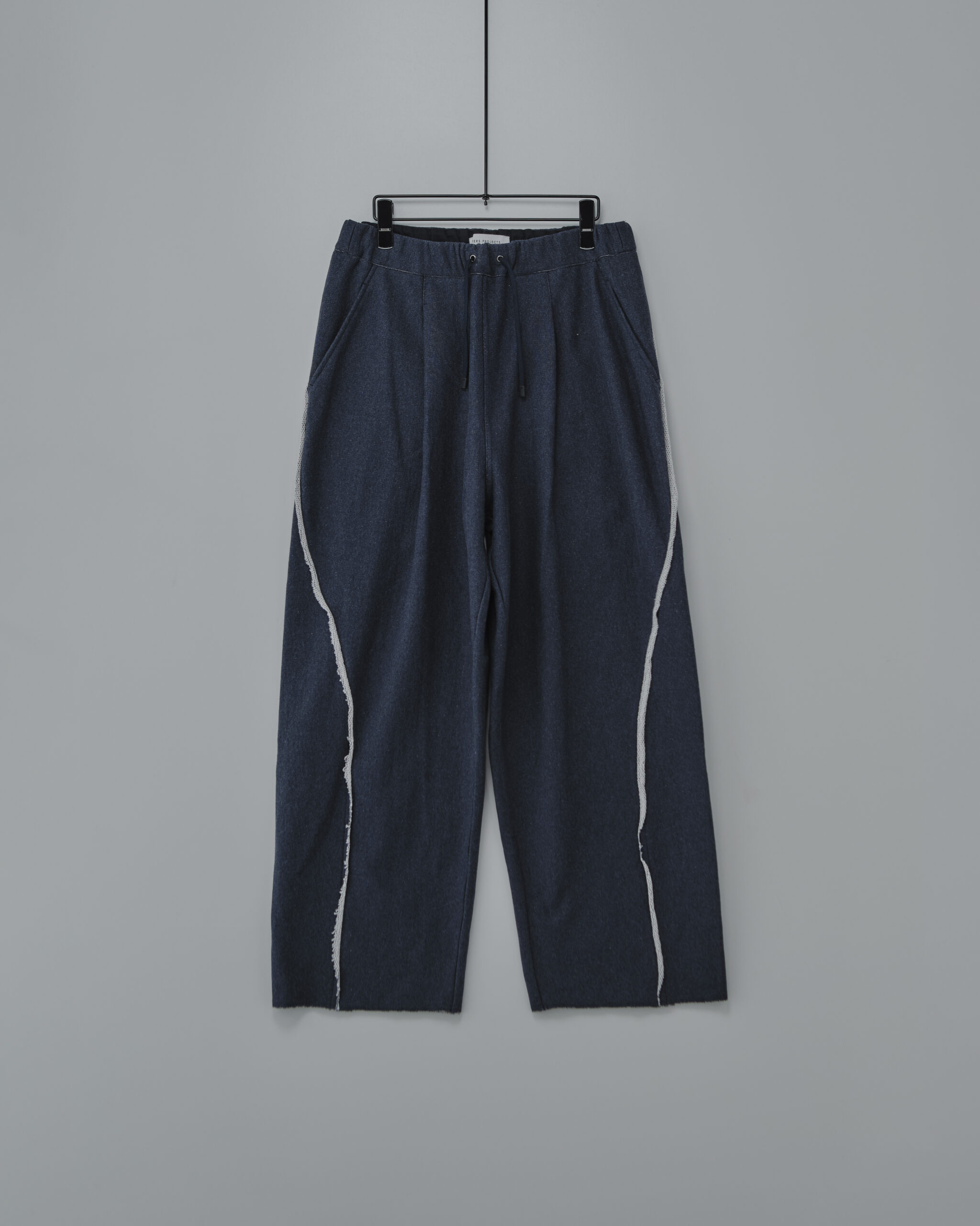 HAKEEM TWIST TROUSERS “TOP NAVY”